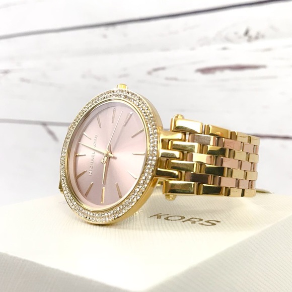 ?MICHAEL KORS? Rose gold and gold watch